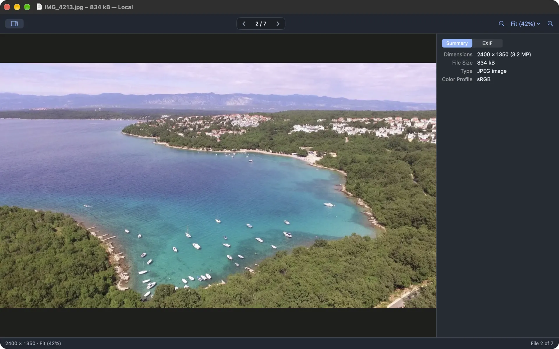 Image viewer: an aerial photo of a bay, with the Summary panel showing dimensions, size, type and colour profile